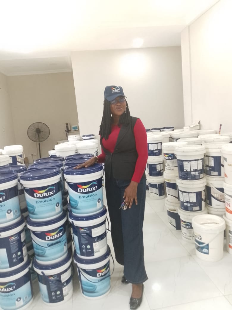 LarryPro Solutions retail paint outlet and showroom with staff providing genuine paint supply services in Lagos.